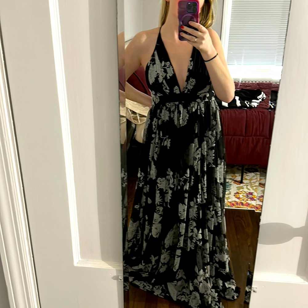 Long flowy black dress with white floral design